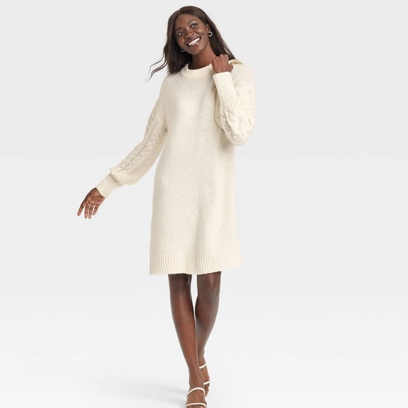 a new day Dresses & Skirts - Beautiful sweater dress with detailed balloon sleeves